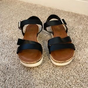 Unisa sandals, worn once.